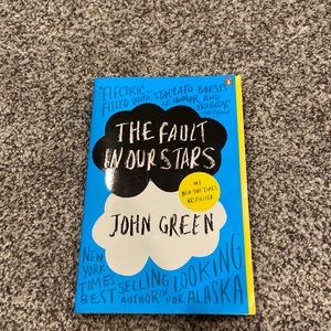 The Fault In OUr Stars book by John Green paperback penguin books teens